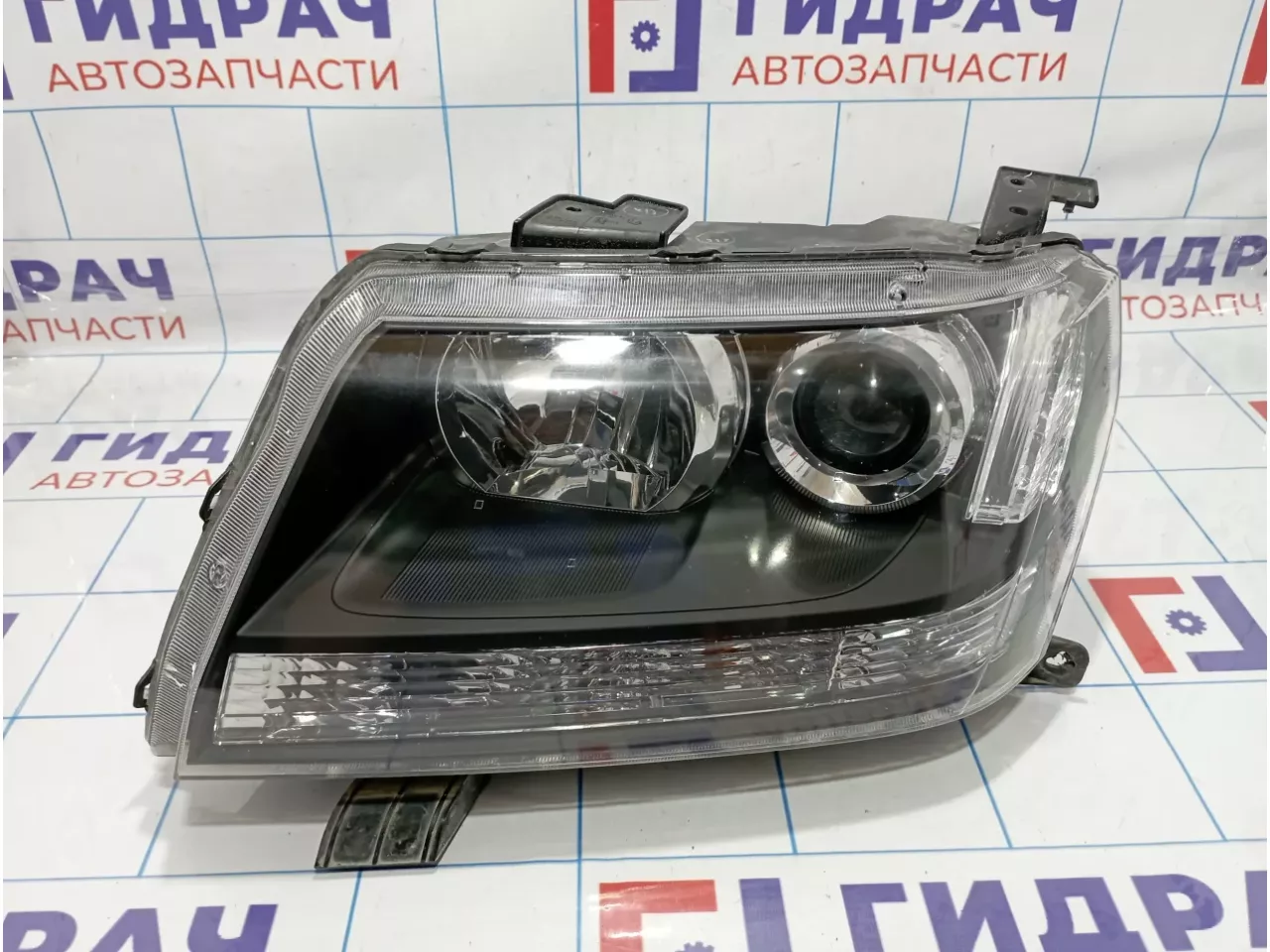 Фара левая Suzuki Grand Vitara (JT) 35320-65JD0